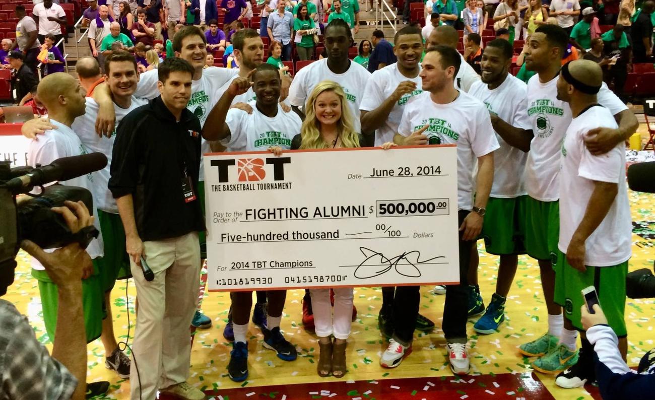 Lindsey presenting the 2014 TBT check to the champions